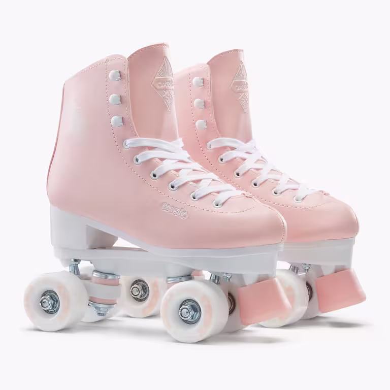 A pair of peach OXELO roller skates with white laces and pink and white wheels